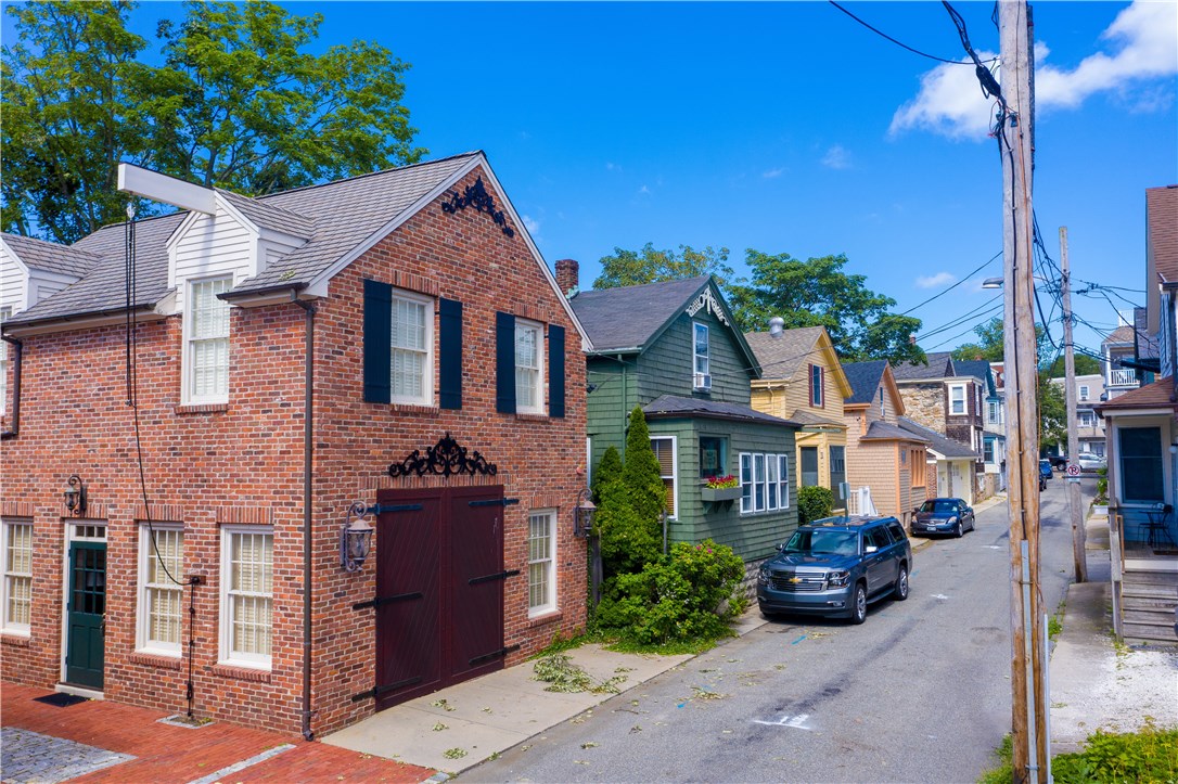 13 Goodwin Street Newport, RI 02840 - Photo 42 of 47 The three wooden cottage sister houses.