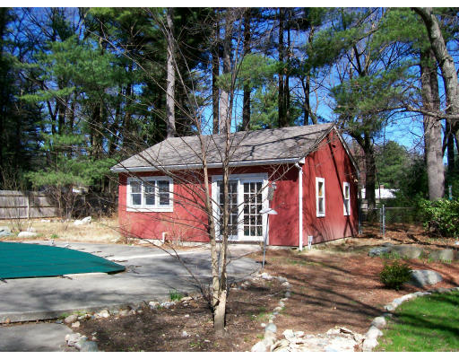 21 Clara Road Framingham, MA 01701 - Photo 5 of 7 a front view of a house with garden