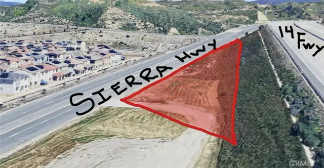 a view of roof and city from the background