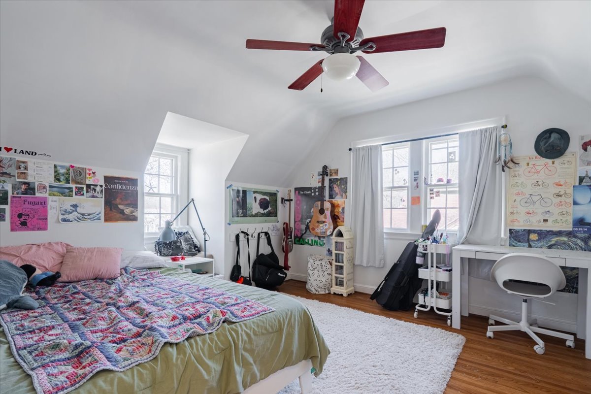 413 Grant Street Normal, IL 61761 - Photo 19 of 40 a bedroom with a bed furniture and a window