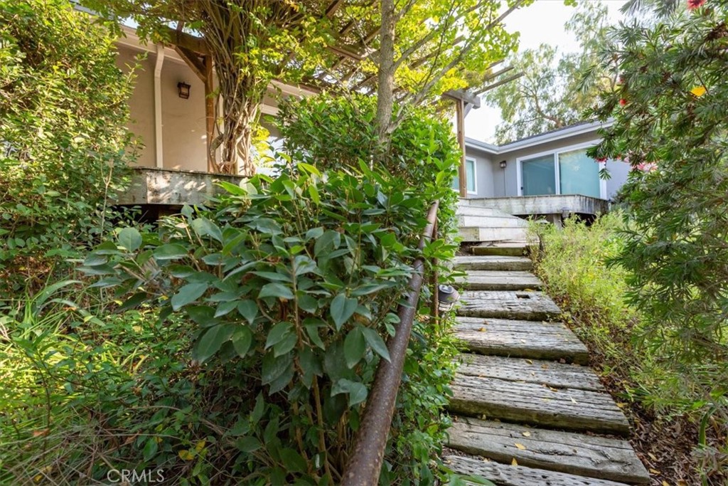 225 Hacienda Avenue San Luis Obispo, CA 93401 - Photo 58 of 75 Wood stairs leading from the shop/apt up to the main house