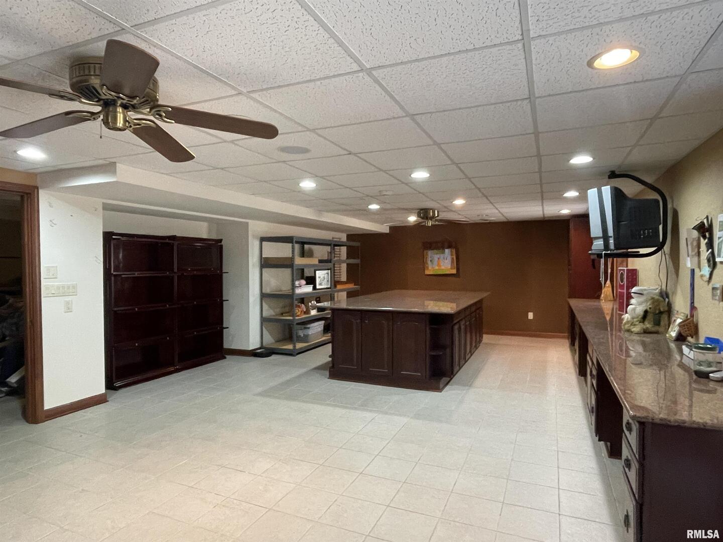 2479 New Era Road Murphysboro, IL 62966 - Photo 25 of 86 a living room with furniture a flat screen tv and kitchen view
