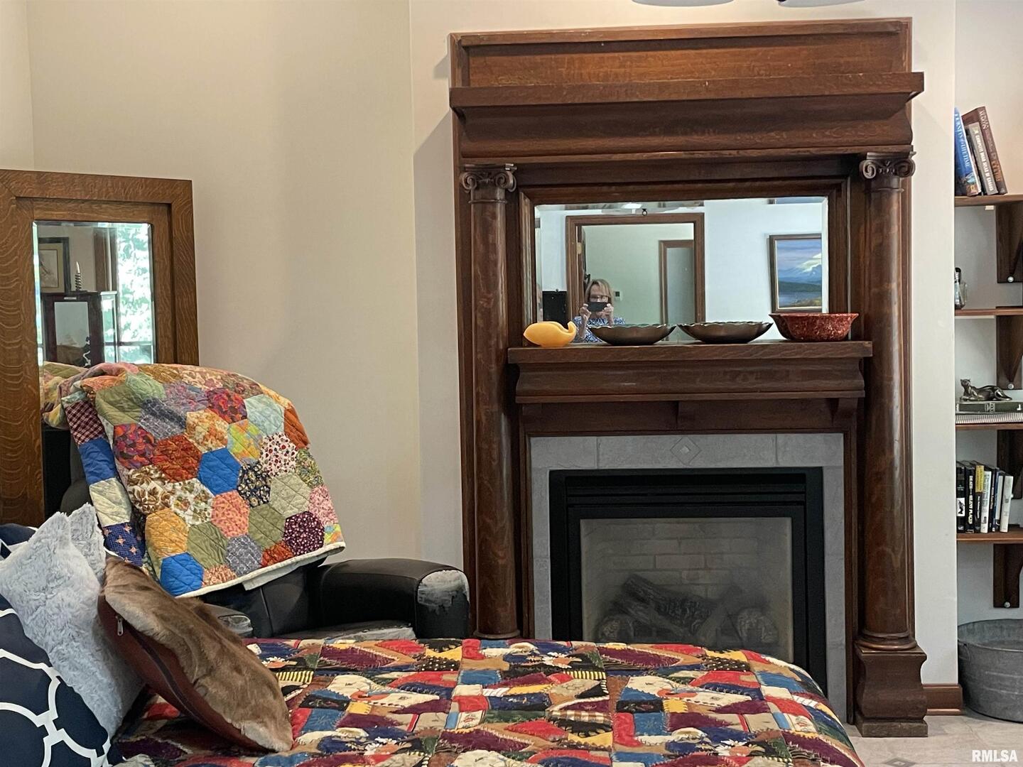 2479 New Era Road Murphysboro, IL 62966 - Photo 38 of 86 a bedroom with a bed and a fireplace