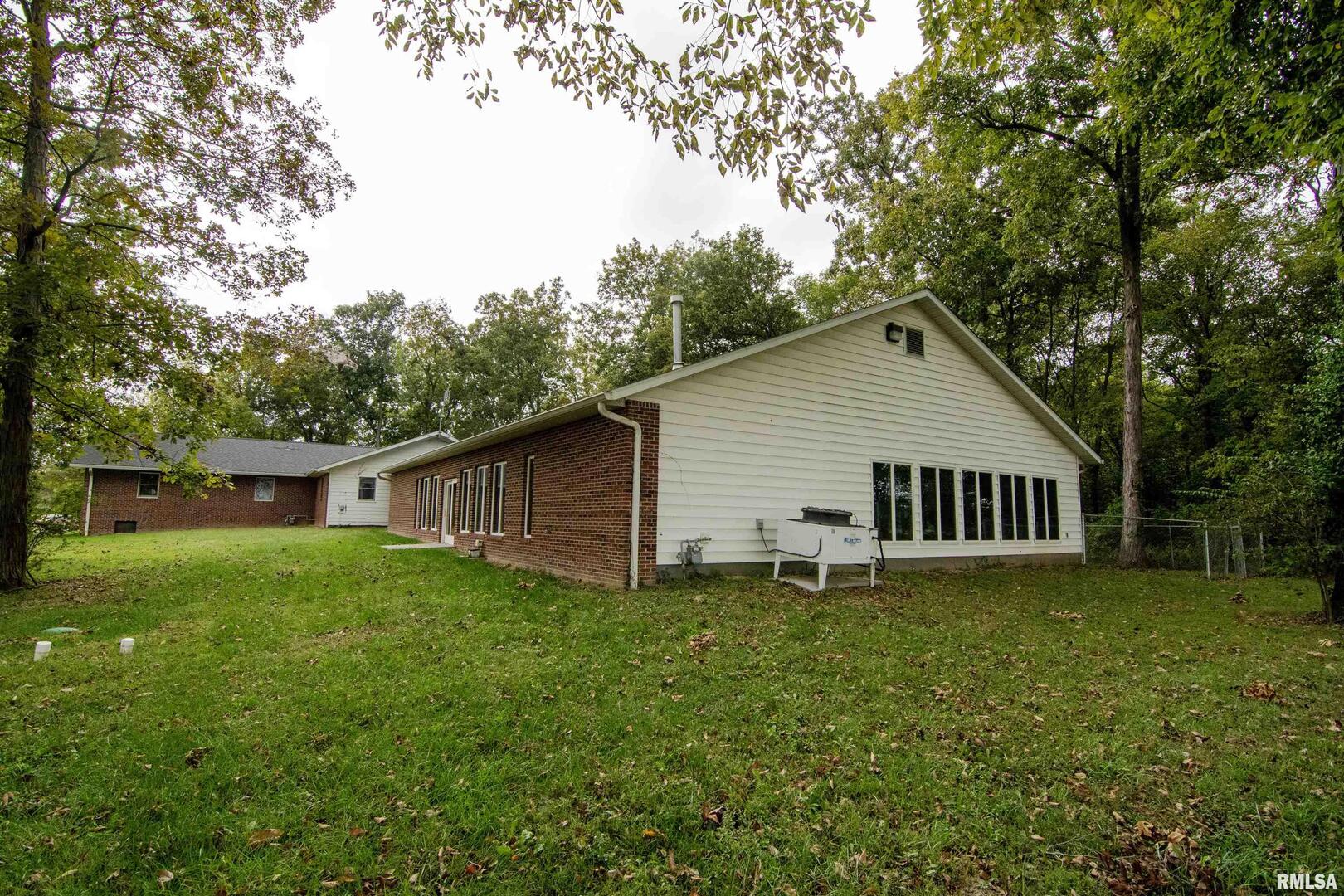 2479 New Era Road Murphysboro, IL 62966 - Photo 4 of 86 a view of a house with a yard