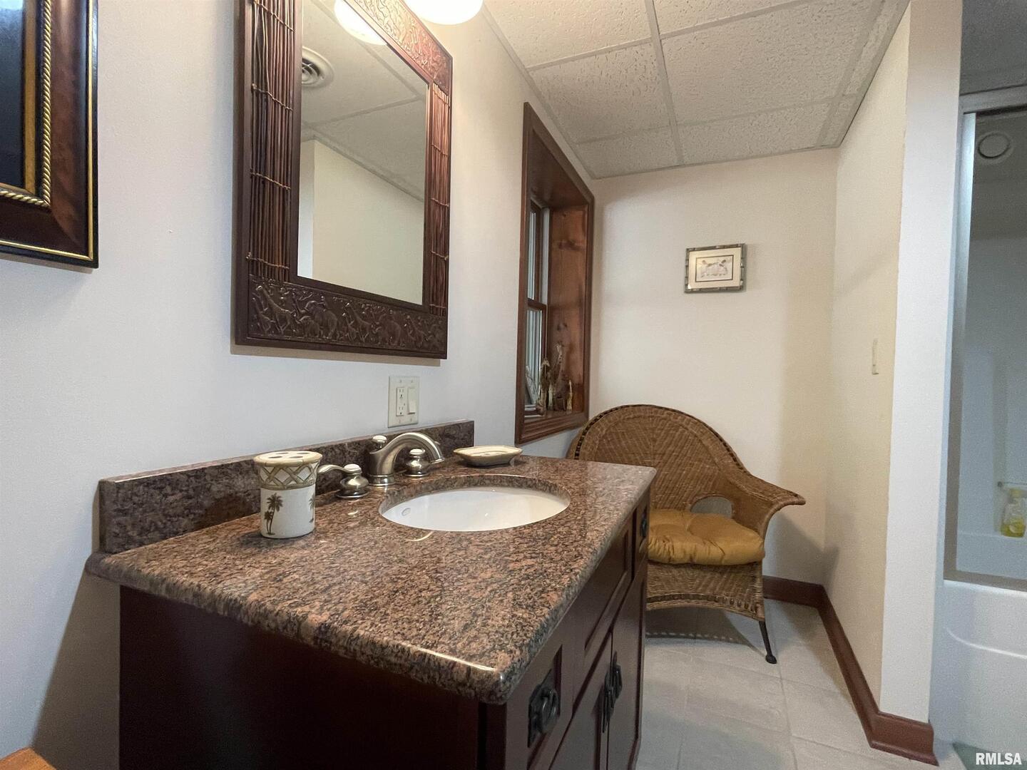 2479 New Era Road Murphysboro, IL 62966 - Photo 46 of 86 a bathroom with a granite countertop sink a toilet and mirror