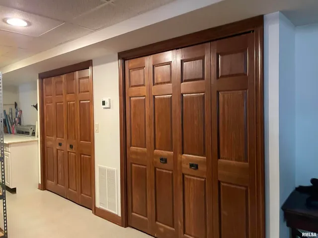 a view of a dining room with furniture and window