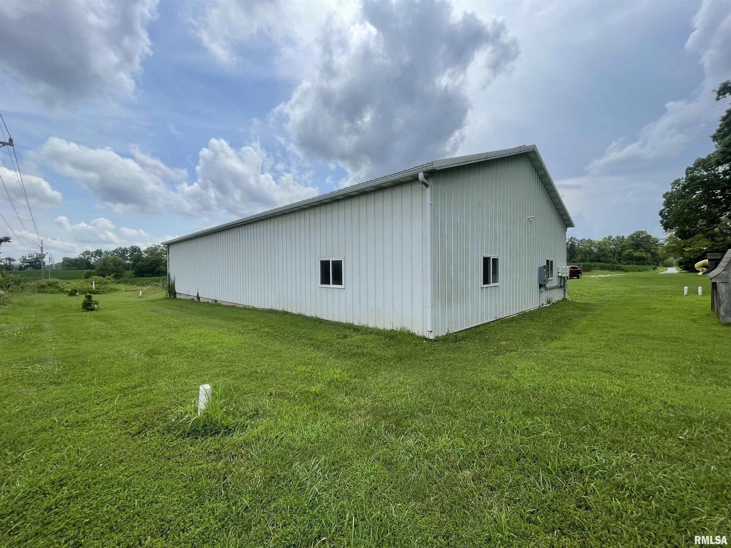 2479 New Era Road Murphysboro, IL 62966 - Photo 74 of 86 a backyard of a house with lots of green space