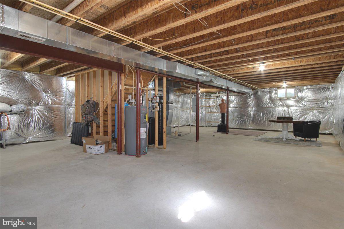 20376 Splendor View Terrace Hagerstown, MD 21740 - Photo 34 of 52 a view of a room with air conditioner duct and materials on floor
