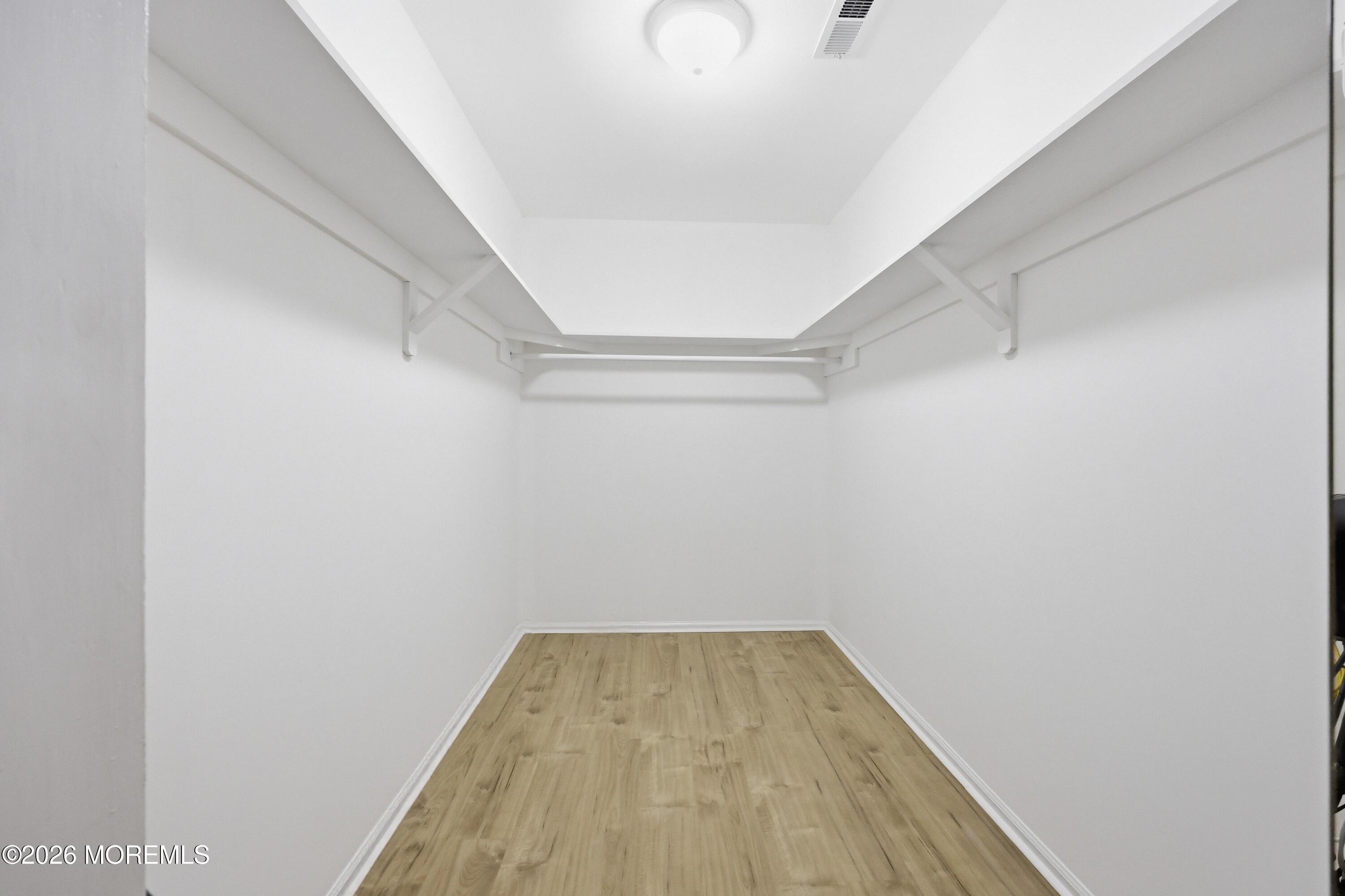 64 Boxwood Terrace Red Bank, NJ 07701 - Photo 15 of 32 a view of a room with wooden floor
