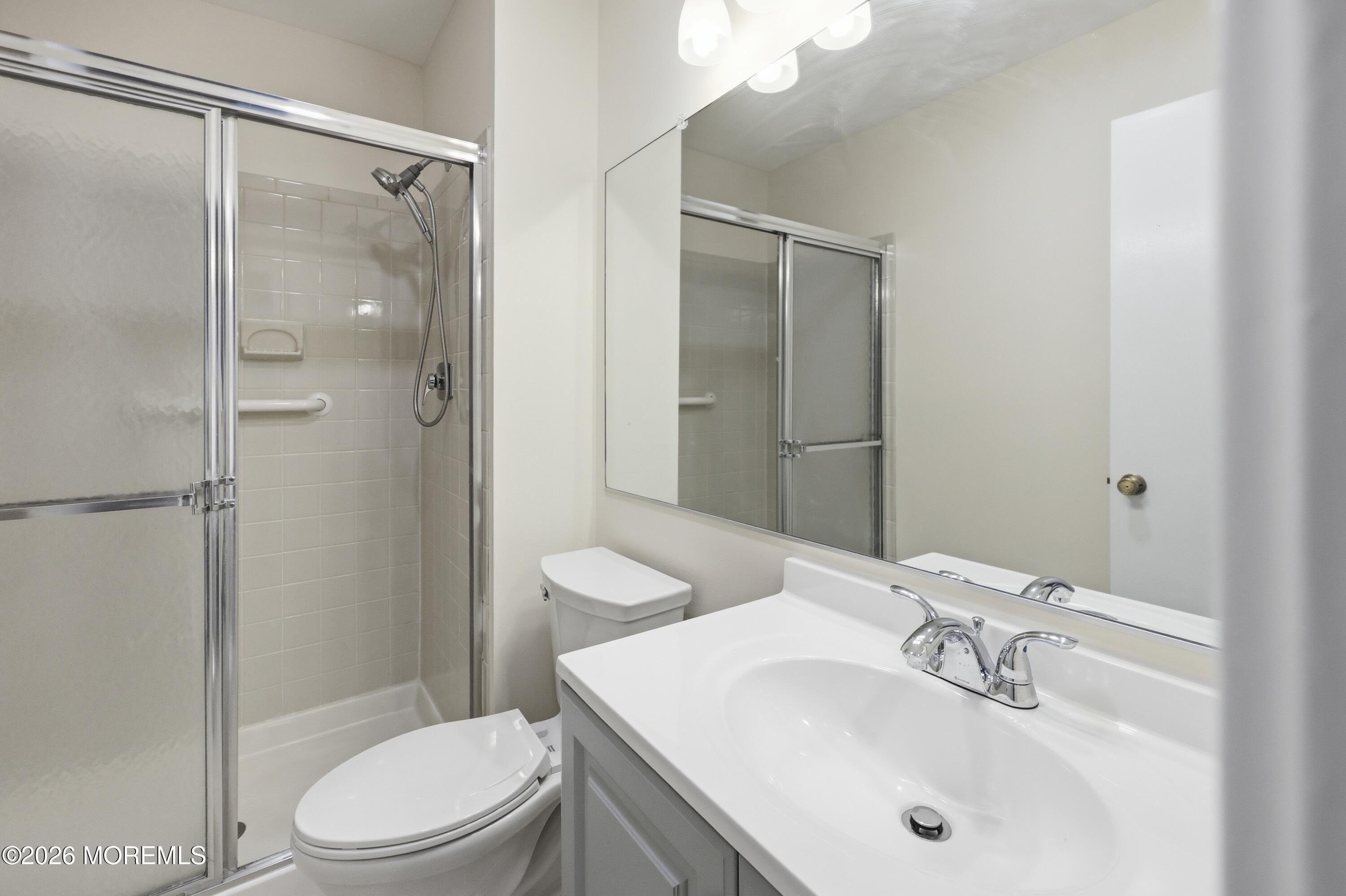 64 Boxwood Terrace Red Bank, NJ 07701 - Photo 17 of 32 a bathroom with a sink toilet and shower