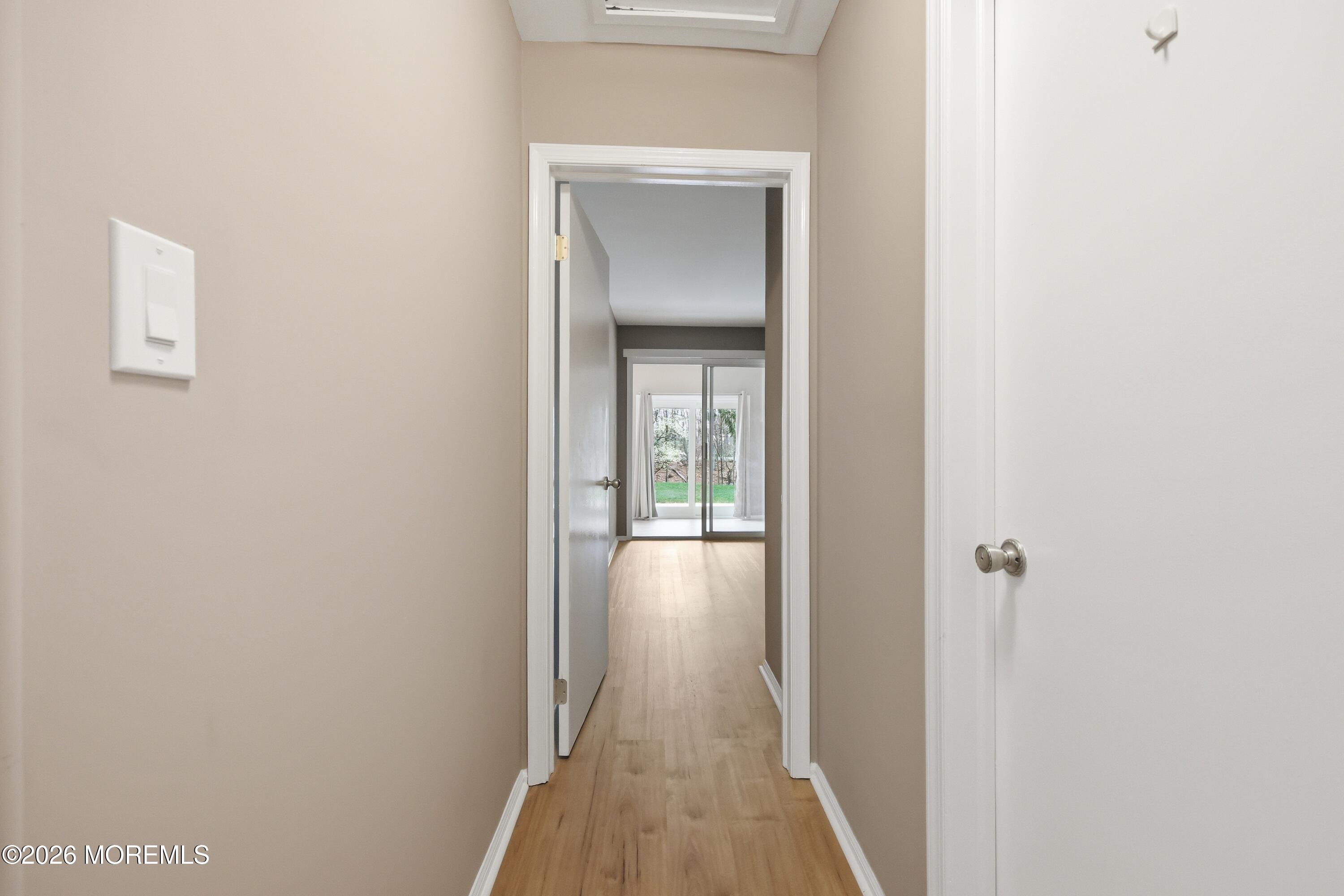 64 Boxwood Terrace Red Bank, NJ 07701 - Photo 18 of 32 a view of a hallway with wooden floor