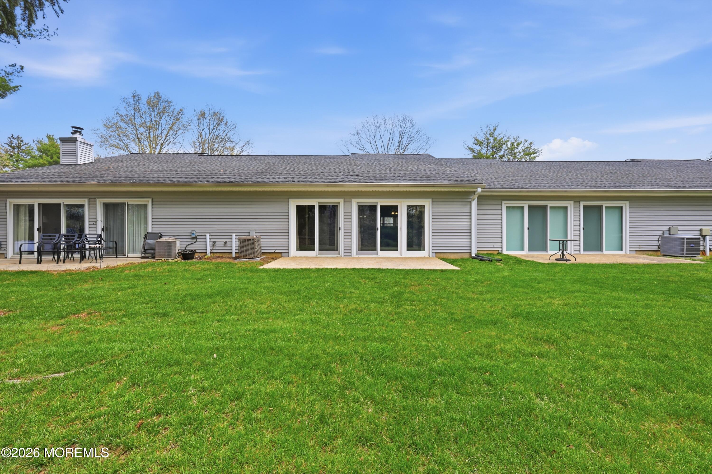 64 Boxwood Terrace Red Bank, NJ 07701 - Photo 25 of 32 a view of a house with a backyard