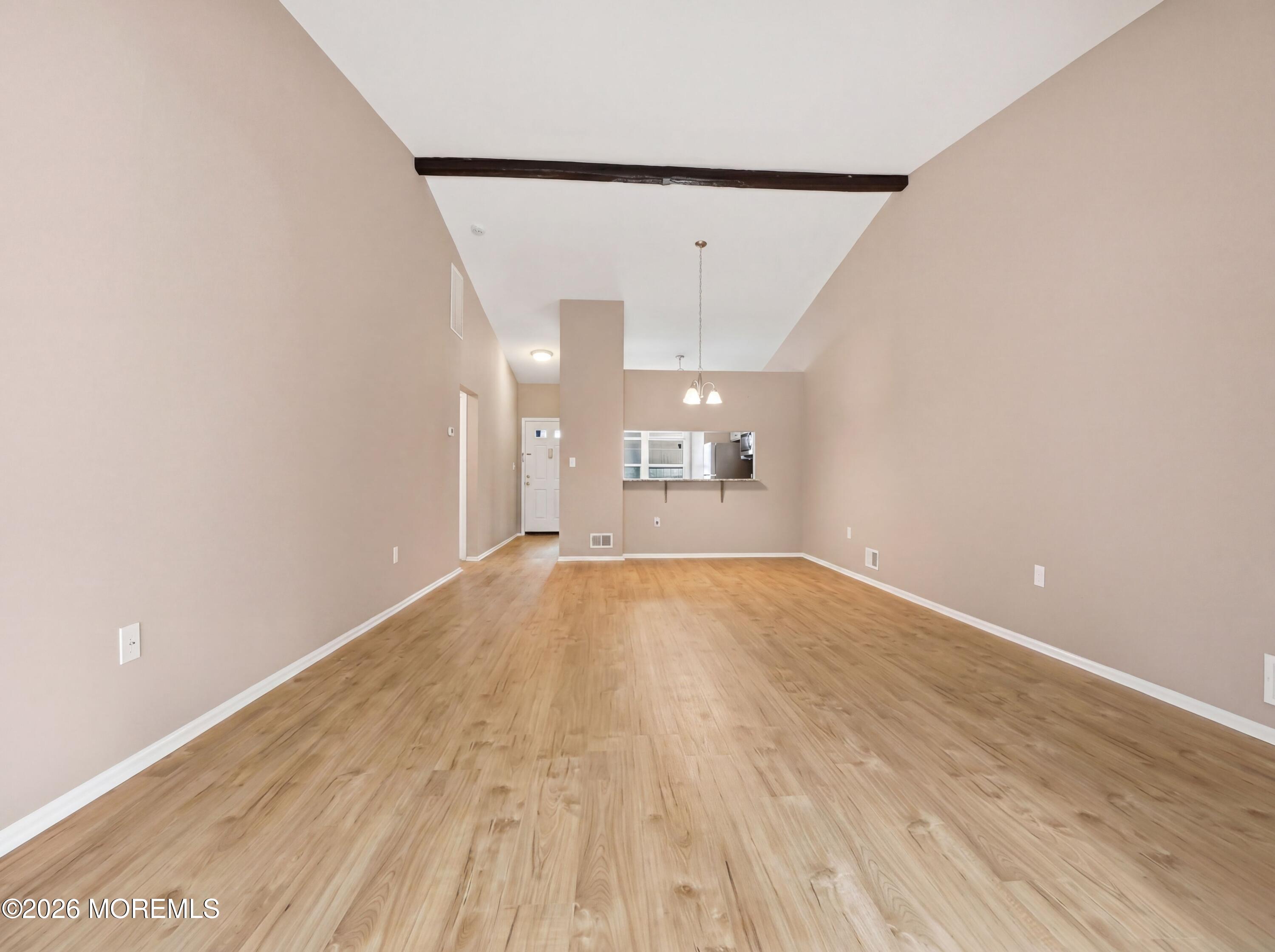 64 Boxwood Terrace Red Bank, NJ 07701 - Photo 7 of 32 a view of empty room with wooden floor