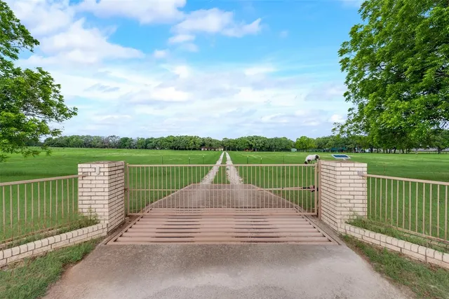 a view of a deck and city view