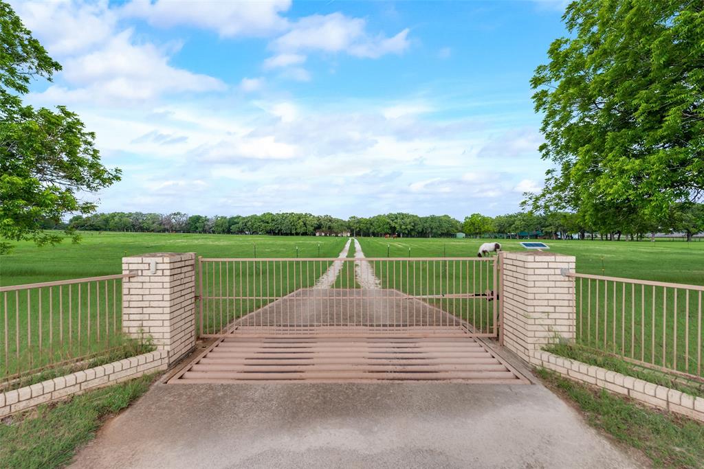 460 West J E Woody Road Springtown, TX 76082 - Photo 3 of 19 a view of a deck and city view