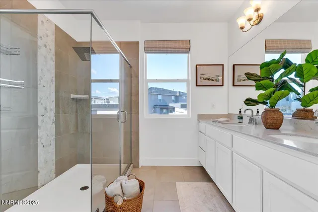 a bathroom with a tub sink and mirror