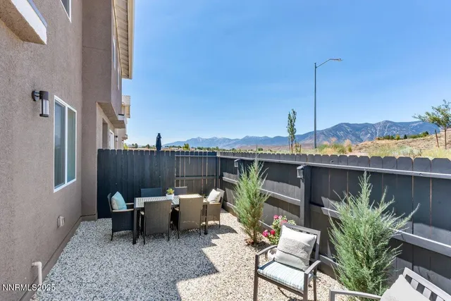 a view of a terrace with furniture and a potted plant