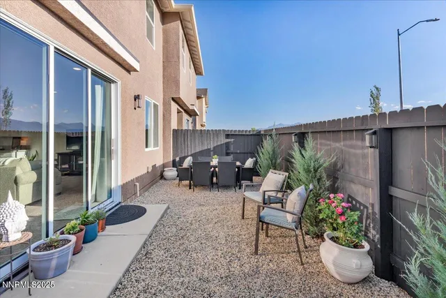 a garden view with a seating space