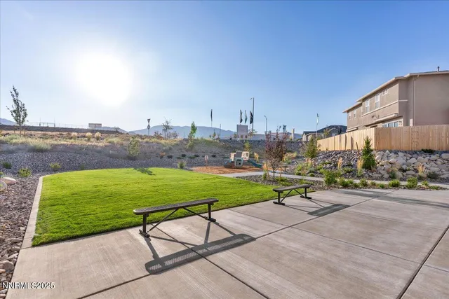 a bench sitting in the middle of a park