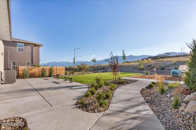 a view of a swimming pool with a lounge chairs