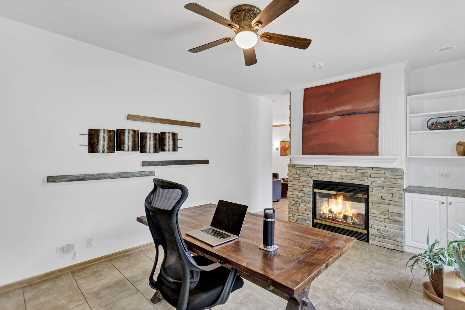734 Ridge Drive Elburn, IL 60119 - Photo 27 of 48 a living room with furniture and a fireplace