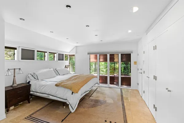 a kitchen with a stove a sink and a refrigerator