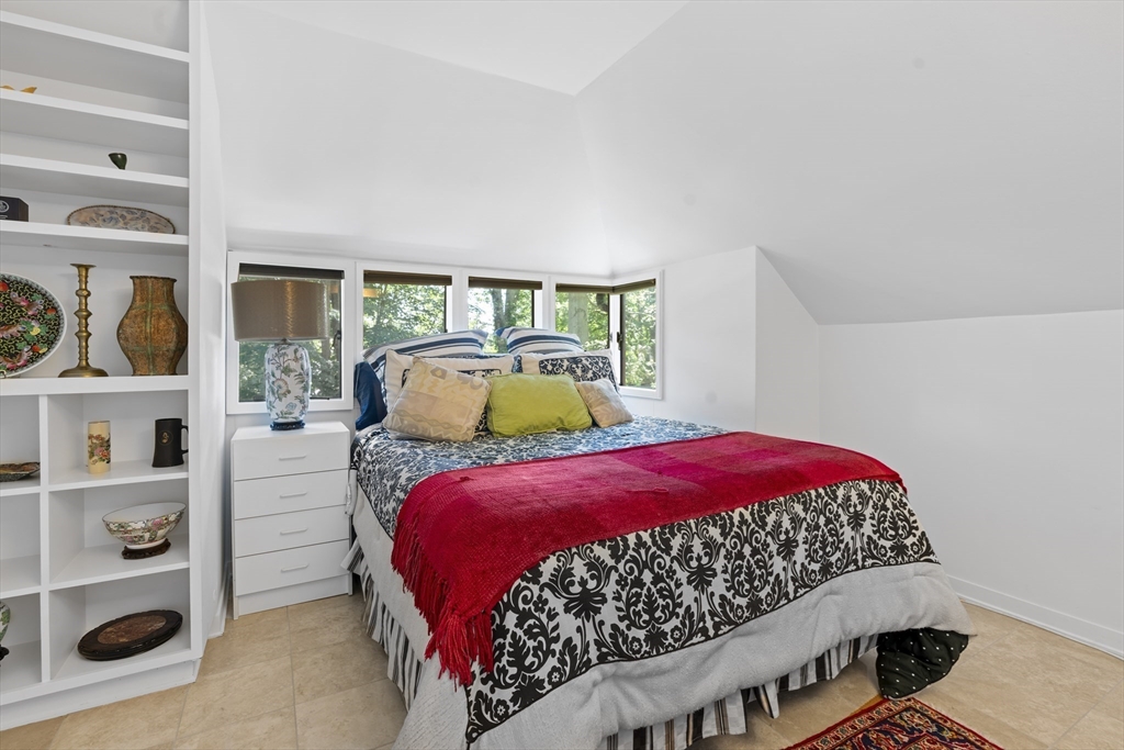 331 Heath Street Brookline, MA 02467 - Photo 20 of 31 a bedroom with a large bed and a window