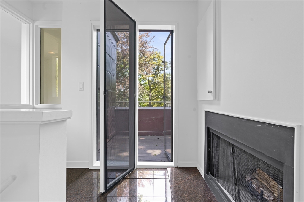 331 Heath Street Brookline, MA 02467 - Photo 22 of 31 a bathroom with a bathtub and a shower
