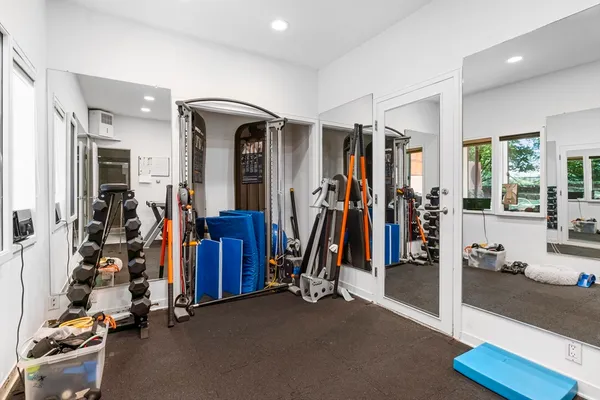 a view of a room with gym equipment