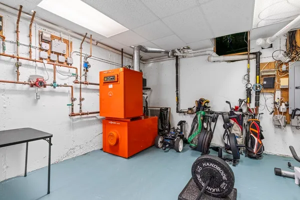 a view of balcony with chairs and potted plants