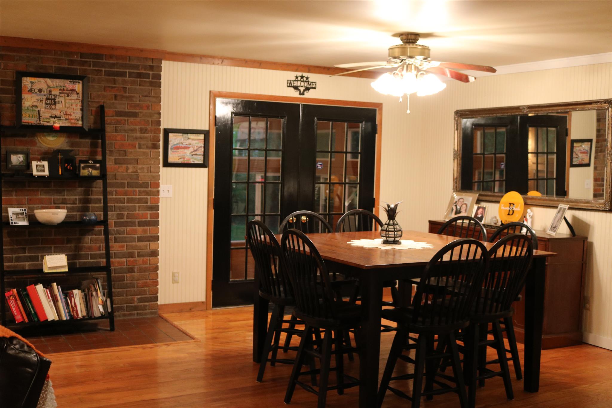 1580 Shady Grove Road Manchester, TN 37355 - Photo 8 of 22 a view of a a dining room with furniture window and wooden floor