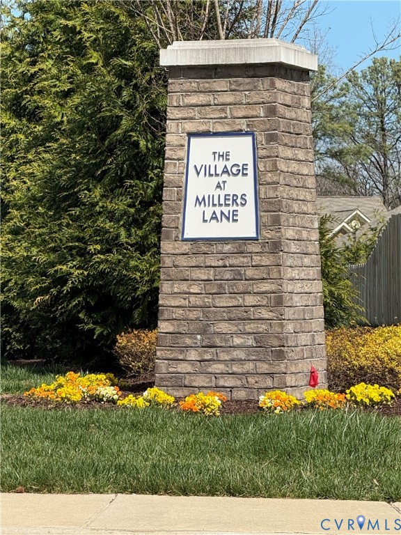 4301 Kidsgrove Road Henrico, VA 23231 - Photo 2 of 2 a sign that is sitting on a brick wall