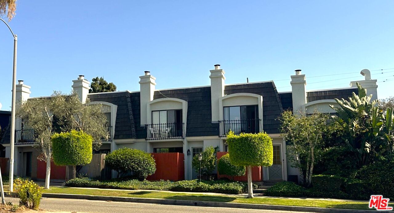 7862 West Manchester Avenue Playa del Rey, CA 90293 - Photo 42 of 44 a front view of a house with garden
