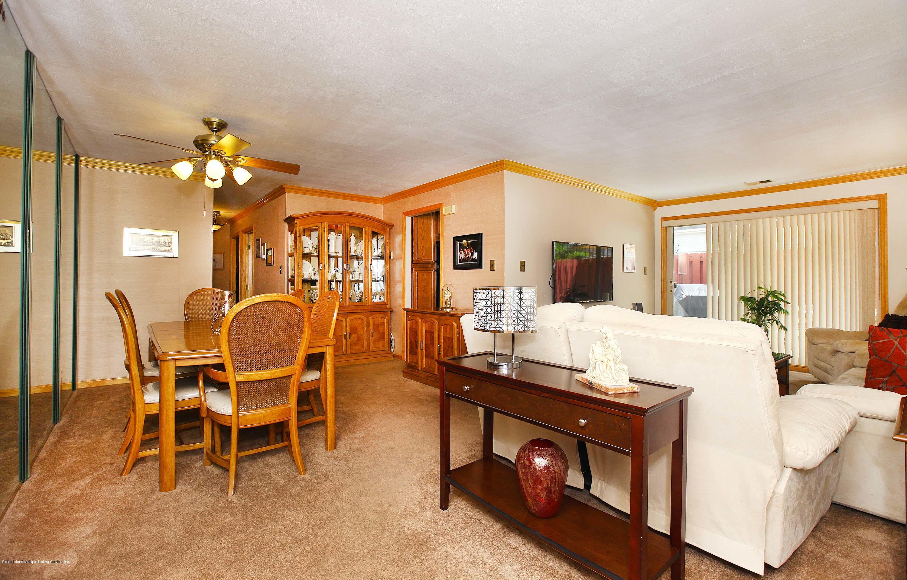 99 Stack Drive Staten Island, NY 10312 - Photo 6 of 16 006_Living Room and Dining Room