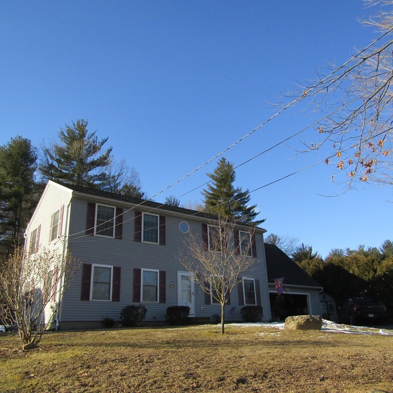 16 Chesterfield Road Northampton, MA 01053 - Photo 1 of 42 a front view of a house with a yard