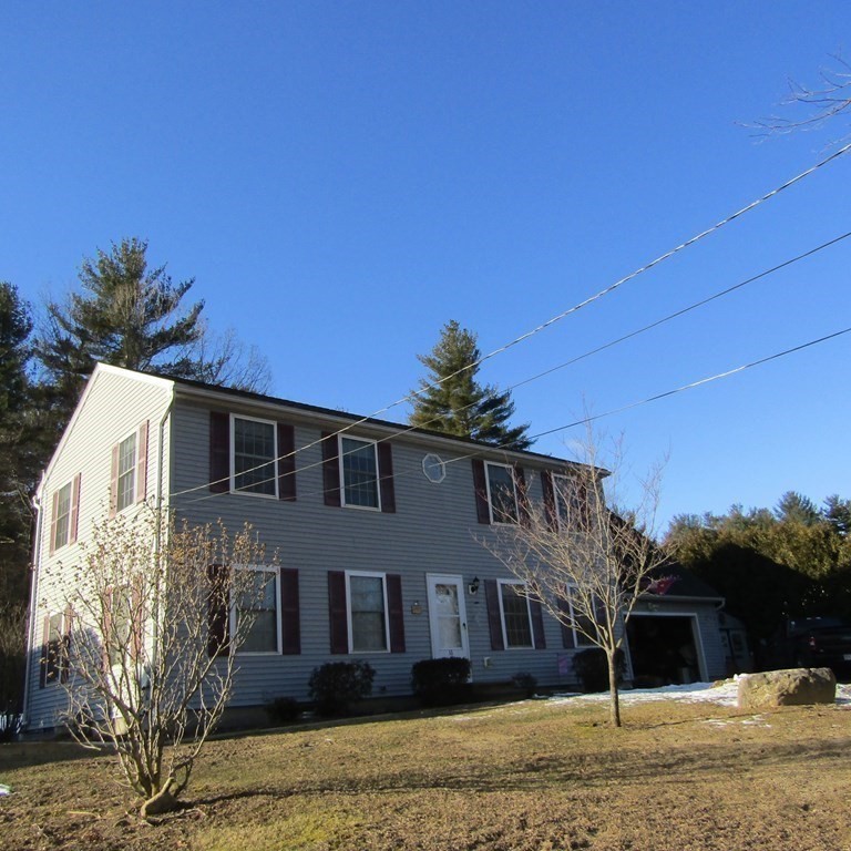 16 Chesterfield Road Northampton, MA 01053 - Photo 3 of 42 a front view of a house with a yard