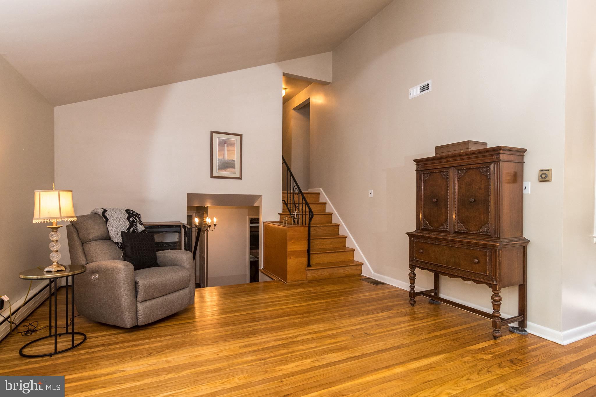 93 Buttonwood Lane Doylestown, PA 18901 - Photo 20 of 35 Spacious living room; notice gleaming wood floors.