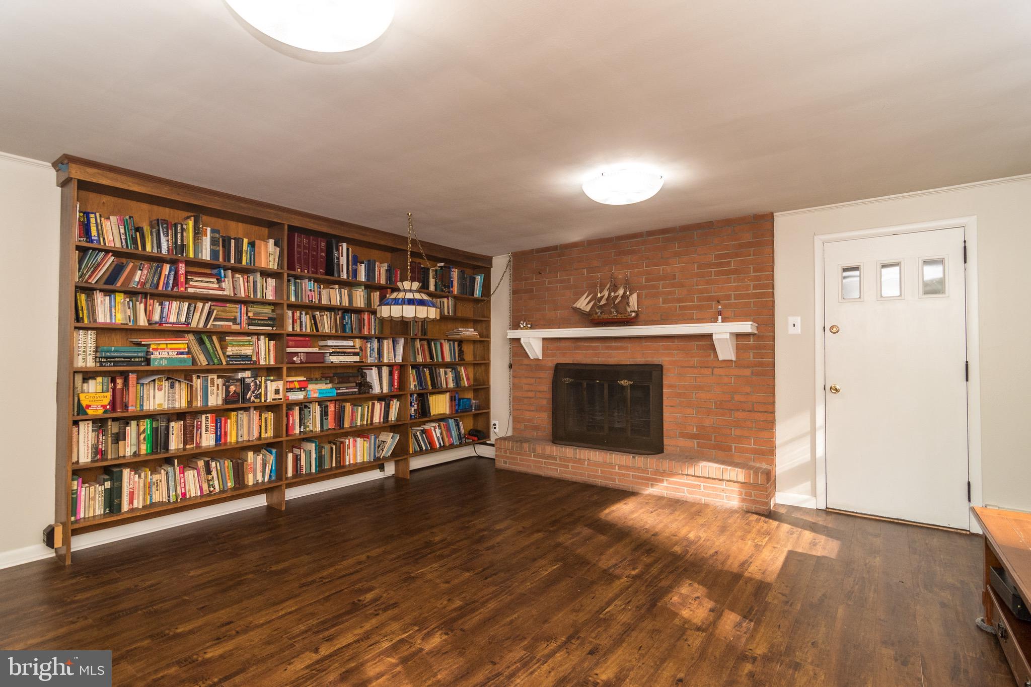 93 Buttonwood Lane Doylestown, PA 18901 - Photo 29 of 35 Recreation room with wood-burning fireplace