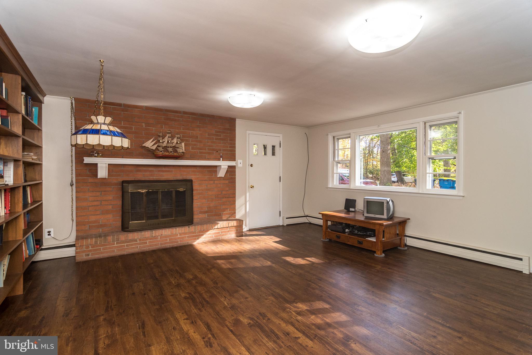 93 Buttonwood Lane Doylestown, PA 18901 - Photo 31 of 35 Recreation room: new engineered wood floors