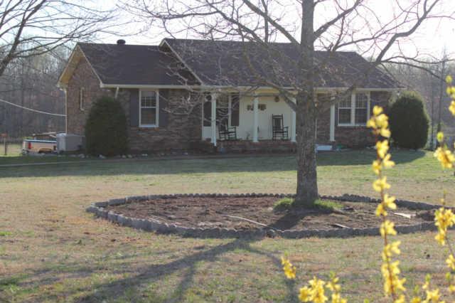 7213 Crow Cut Road Fairview, TN 37062 - Photo 1 of 20 Full brick ranch home on 2 level acres. This well-maintained home was quality built by the owners. Home is 1 mile to local schools and Walmart, 2 miles to Bowie Nature Park, Publix and City Hall, and 4 miles to I-840.