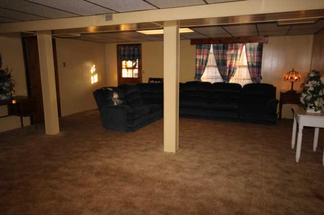 7213 Crow Cut Road Fairview, TN 37062 - Photo 17 of 20 The recreation room in the basement with the walk-out to the back yard.