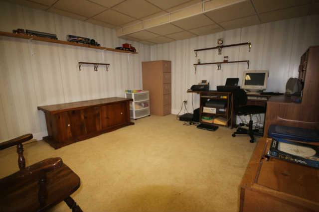 7213 Crow Cut Road Fairview, TN 37062 - Photo 18 of 20 Another room in the basement is currently used as an office/hobby room. Has been used as a bedroom.