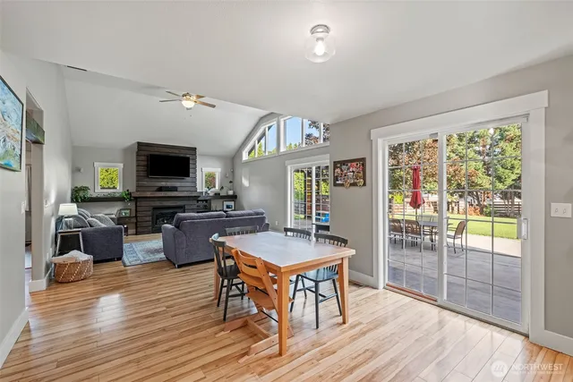a view of a livingroom with furniture window and wooden floor
