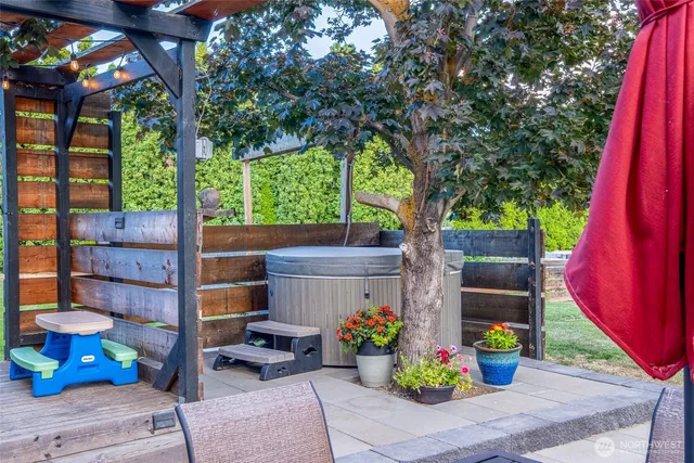 a front view of a house with outdoor seating