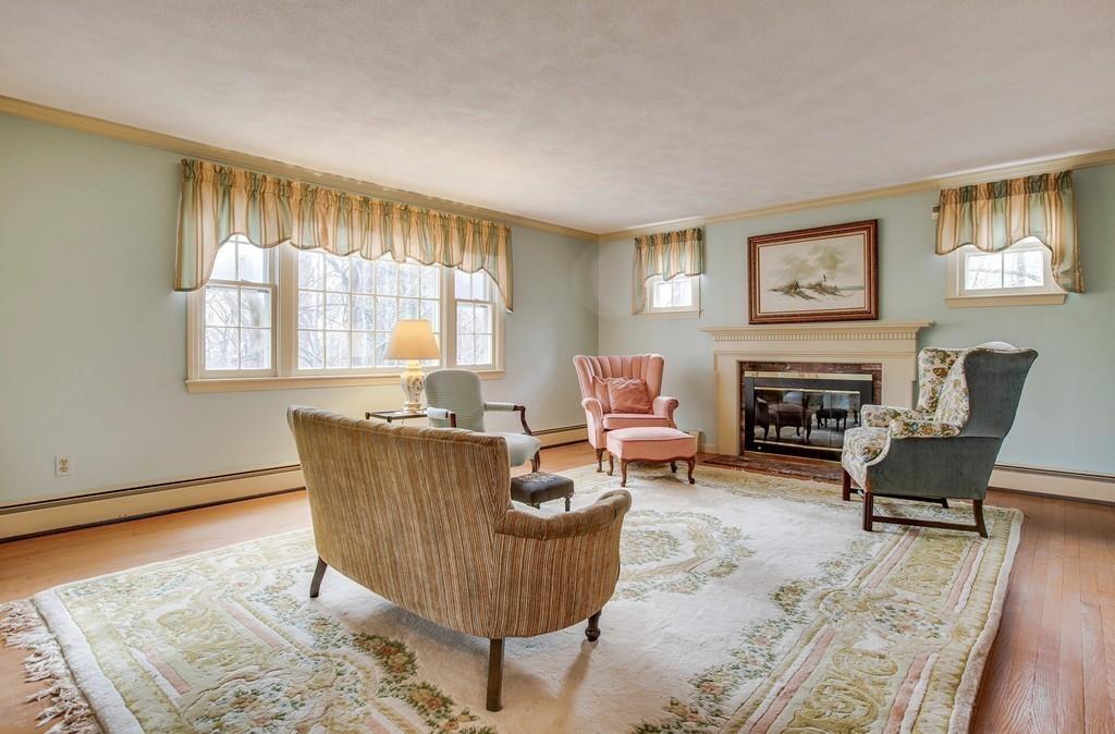 250 Old Littleton Road Harvard, MA 01451 - Photo 12 of 35 a living room with furniture and a fireplace