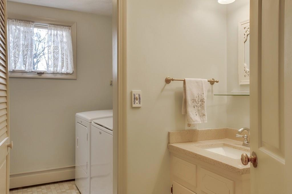 250 Old Littleton Road Harvard, MA 01451 - Photo 14 of 35 a bathroom with a sink and a mirror