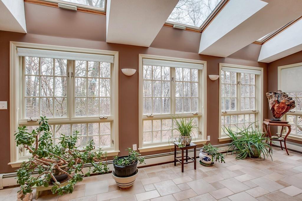 250 Old Littleton Road Harvard, MA 01451 - Photo 18 of 35 a living room filled with furniture and a potted plant