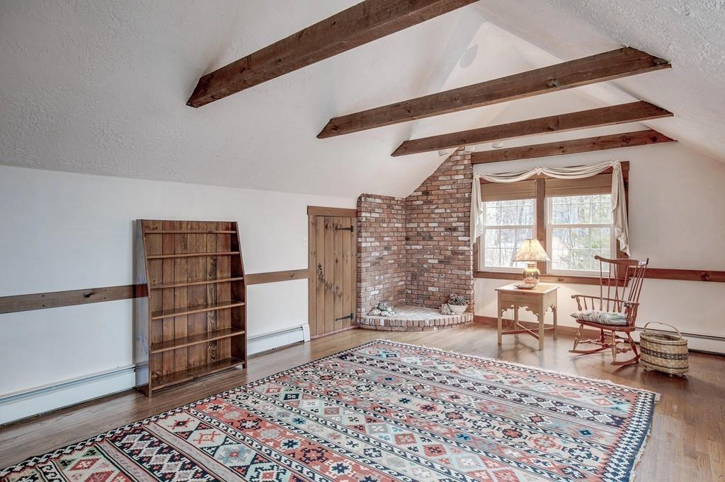 250 Old Littleton Road Harvard, MA 01451 - Photo 23 of 35 a living room with furniture and a rug