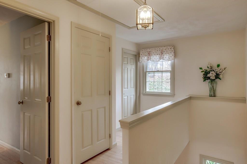 250 Old Littleton Road Harvard, MA 01451 - Photo 26 of 35 a view of an entryway with a chandelier