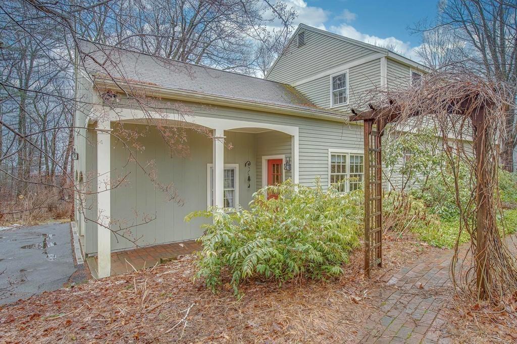 250 Old Littleton Road Harvard, MA 01451 - Photo 5 of 35 a view of a house with a yard